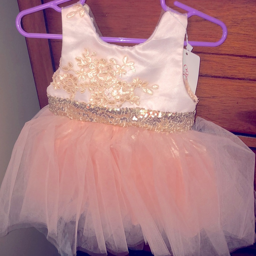 Pink and gold sequin dress with bow